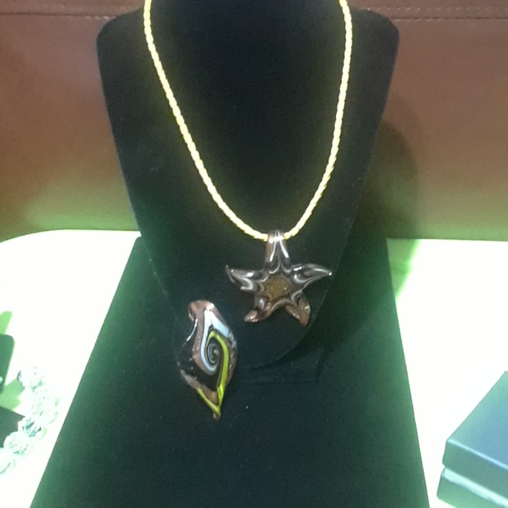 2 Murano type glass pendant with yellow cord neck